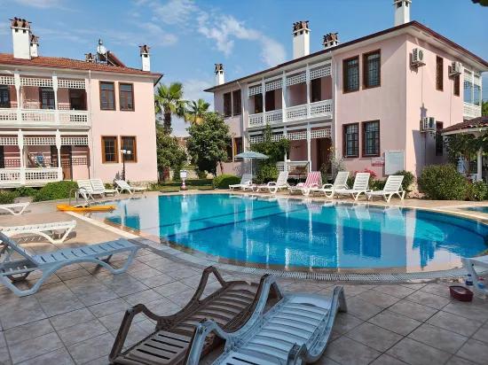 Von Bersu Yatırım, In der Nähe von Çalış Plaj, ein möbliertes Apartment In einer Wohnanlage mit Pool zur Miete