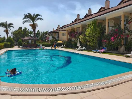 From Bersu Yatırım, Seafront Poolside Site Triplex Villa